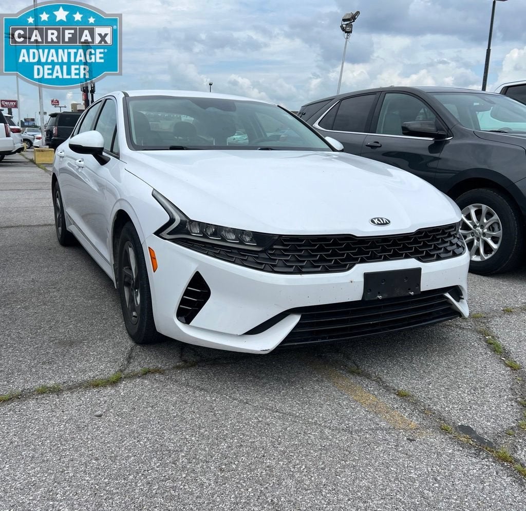 2021 Kia K5 LXS in White — front three-quarter view